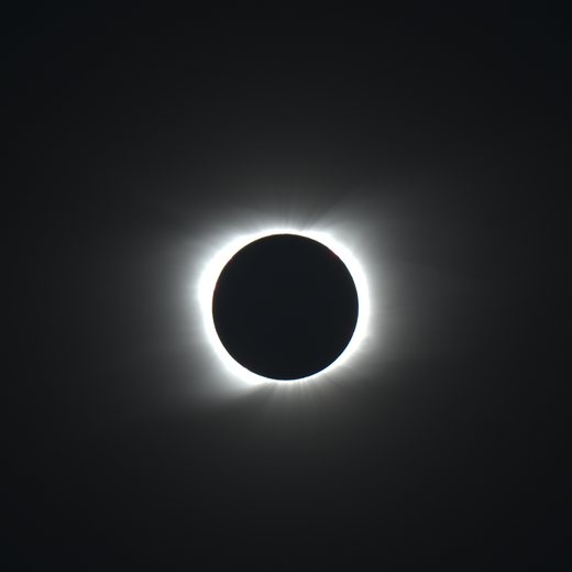 Eclipse frame at 1/20 s: the corona extending outward, the limb approaching clipping.